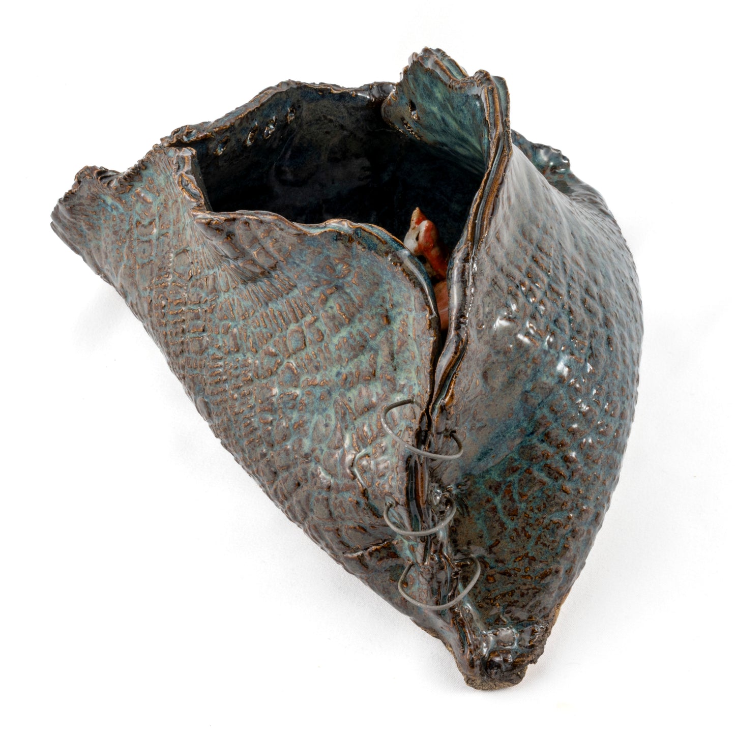 A Fox's Den Ceramic Triangular Sculpture
