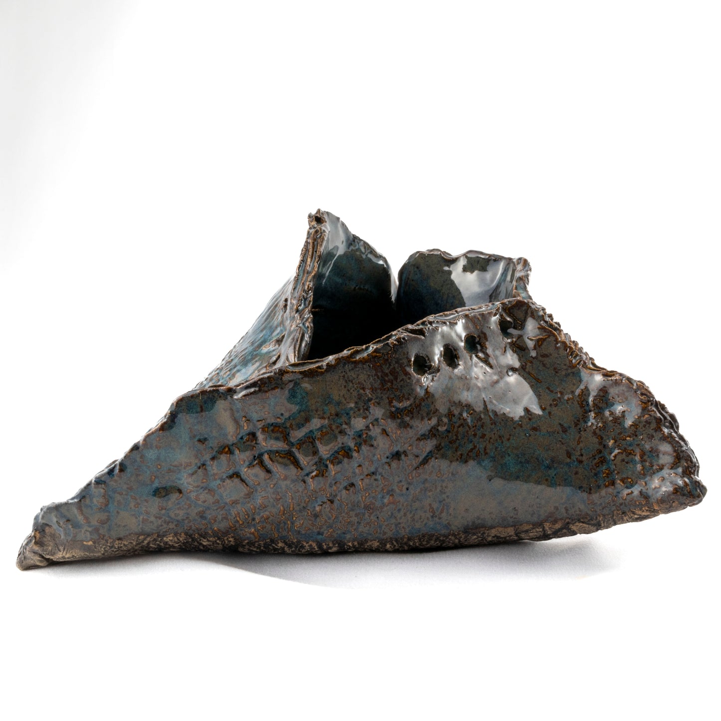 A Fox's Den Ceramic Triangular Sculpture